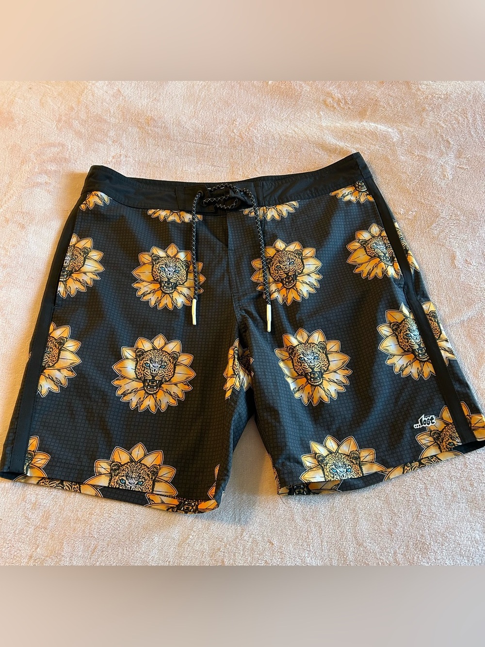 Lost black board surf shorts yellow leopard and flower print size 32 beach